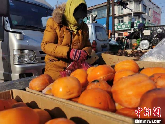 吉林满族传统“老集”里寻“年味儿”的年轻人